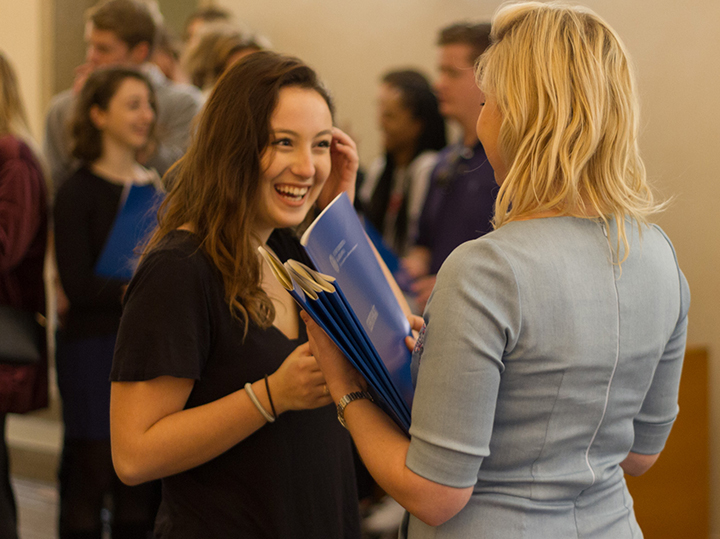 Two students conversing at Charles University in the Czech Republic.